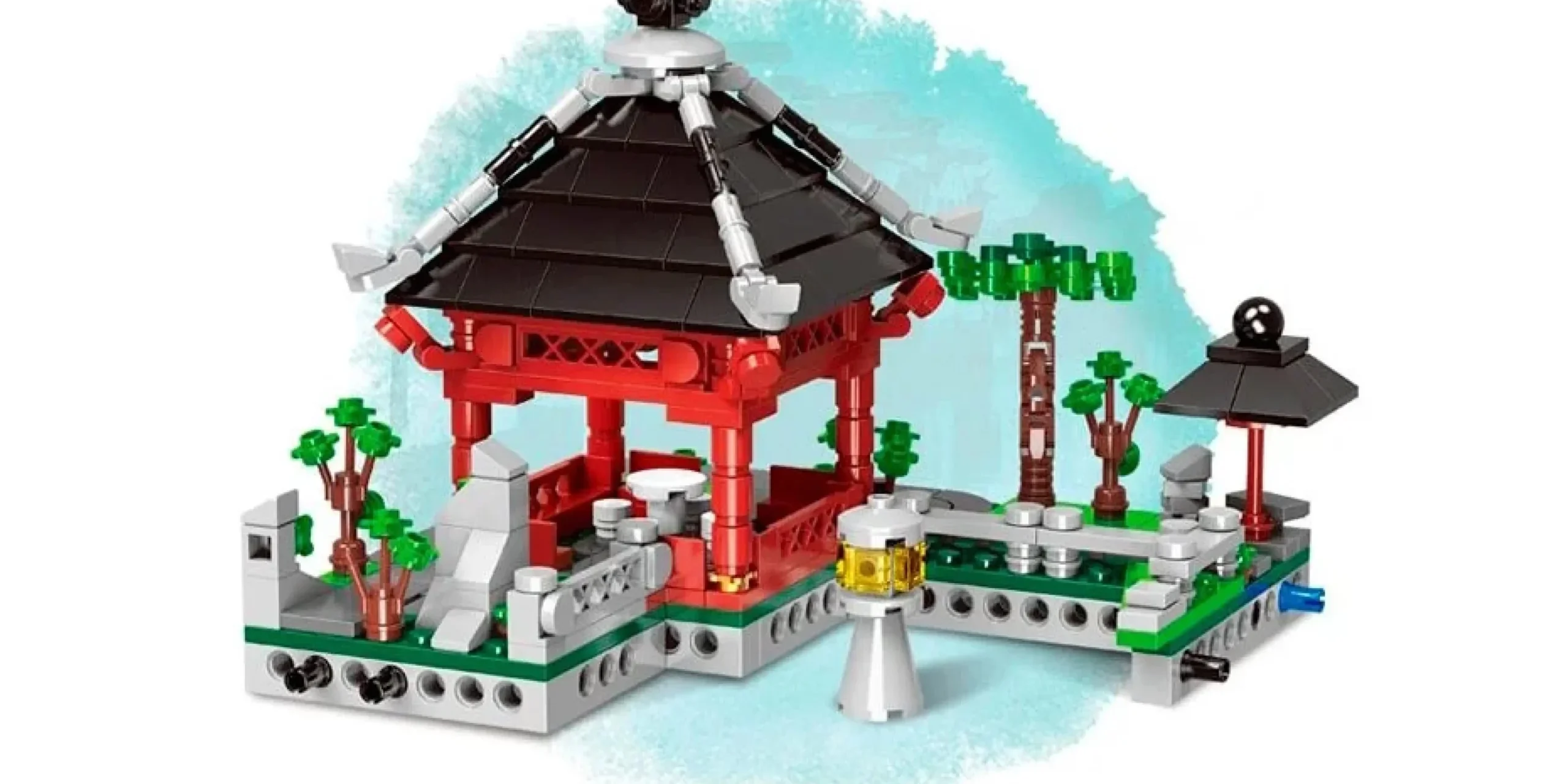 set-construccion-templo-japones-miniatura-ciudad Set de bloques de construcción de un templo oriental con tejado negro y detalles rojos, ideal para crear mundos en miniatura.
